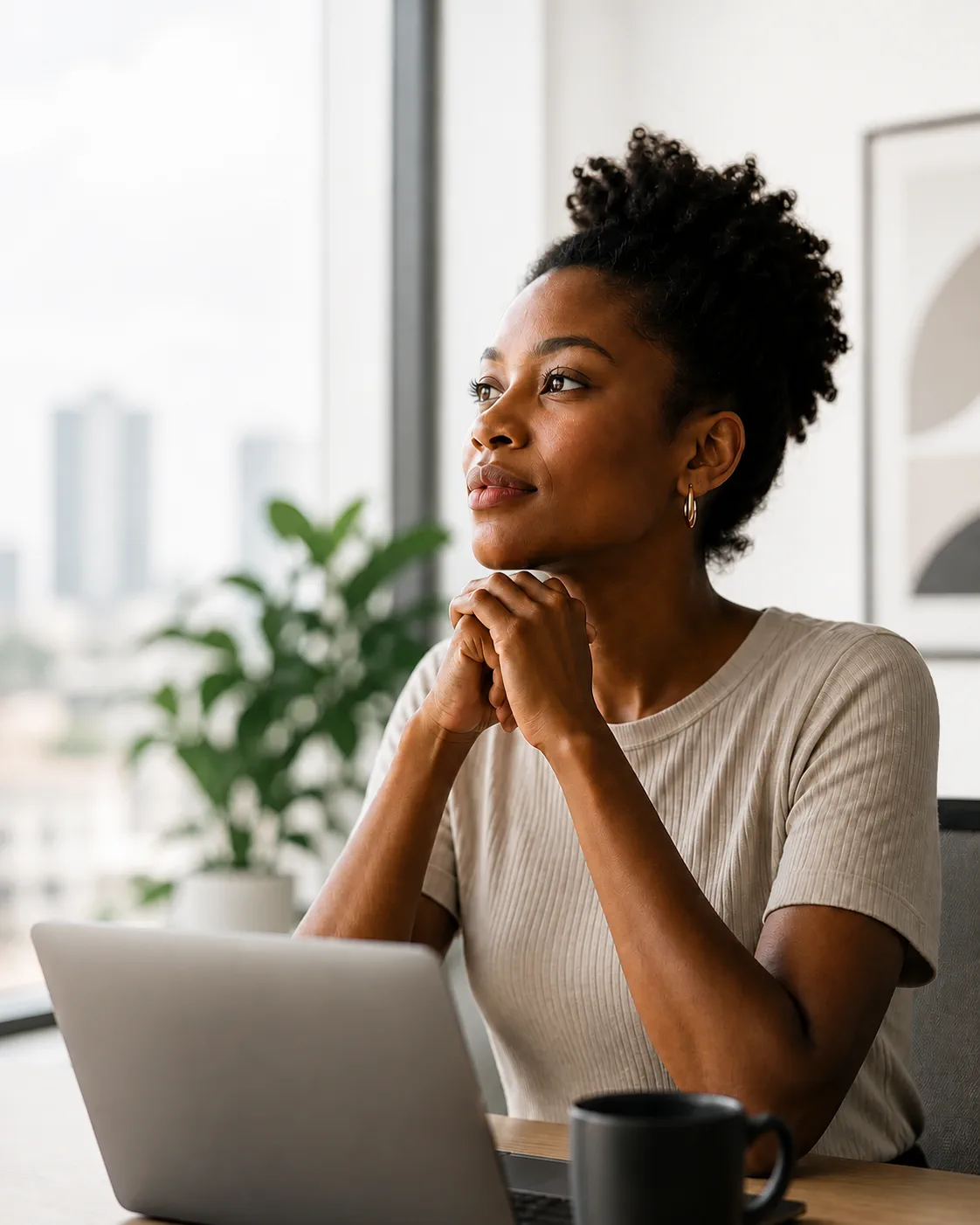 Nigerian technology leader working in a bright modern office